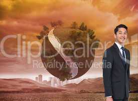 Composite image of smiling asian businessman