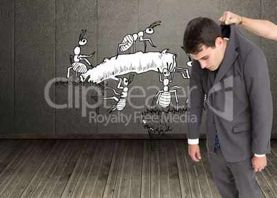 Composite image of businessman hanging