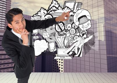 Composite image of thoughtful asian businessman pointing