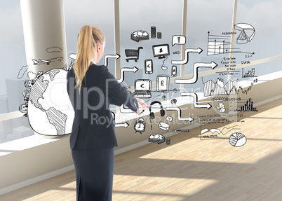 Composite image of businesswoman pulling a rope