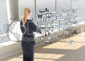 Composite image of businesswoman pulling a rope