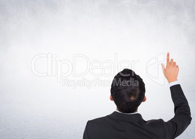 Composite image of asian businessman pointing