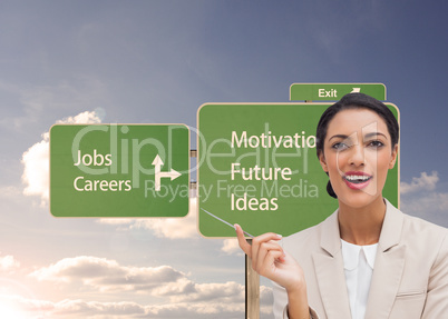 Composite image of smiling businesswoman holding a pen