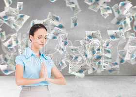 Composite image of peaceful young businesswoman praying