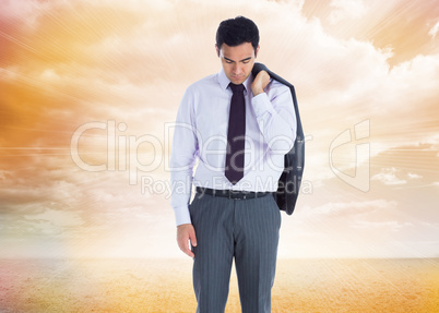 Composite image of unsmiling businessman standing