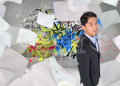 Composite image of serious asian businessman