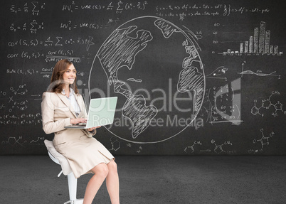 Composite image of smiling businesswoman sitting and using lapto