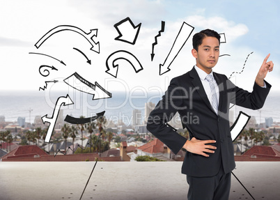 Composite image of unsmiling asian businessman pointing