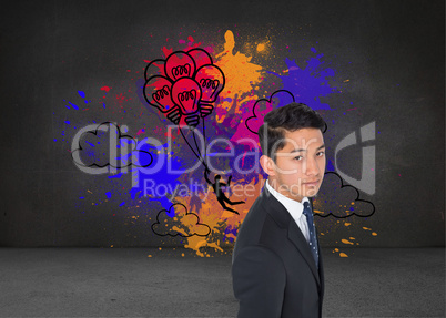 Composite image of serious asian businessman