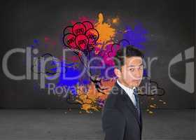 Composite image of serious asian businessman