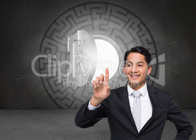 Composite image of smiling asian businessman pointing