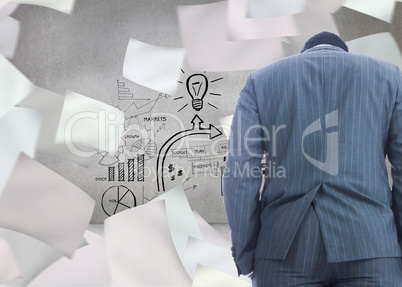 Composite image of businessman standing