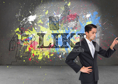 Composite image of unsmiling asian businessman pointing