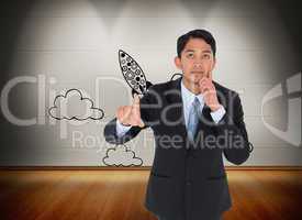 Composite image of thoughtful asian businessman pointing