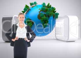 Composite image of businesswoman standing with hands on hips