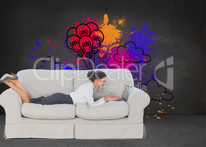 Composite image of business woman lying on couch