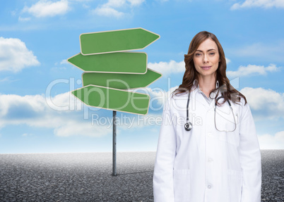 Composite image of happy doctor looking at camera