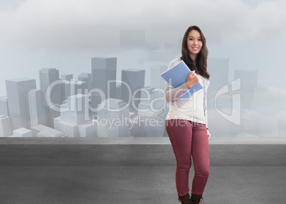 Composite image of smiling student in a computer room