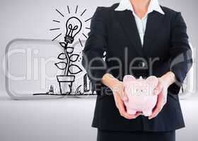 Composite image of businesswoman holding piggy bank