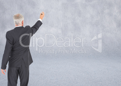 Composite image of rear view of serious businessman standing and