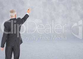 Composite image of rear view of serious businessman standing and