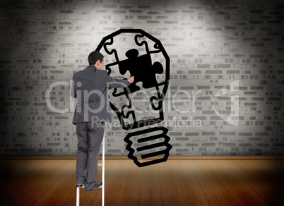 Composite image of businessman standing on ladder