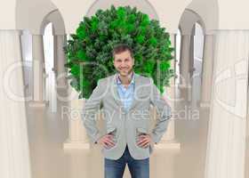 Composite image of stylish man smiling with hands on hips