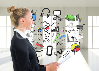 Composite image of businesswoman holding tablet