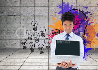 Composite image of businessman showing a laptop Composite image of businessman showing a laptop