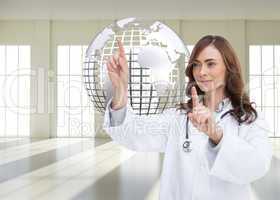 Composite image of happy doctor pointing