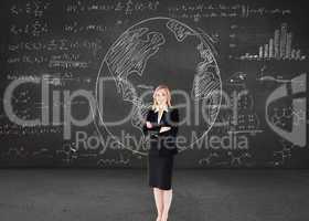 Composite image of a confident businesswoman with folded arms