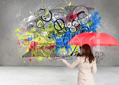 Composite image of businesswoman holding umbrella