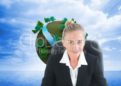 Composite image of businesswoman sitting on swivel chair with ta