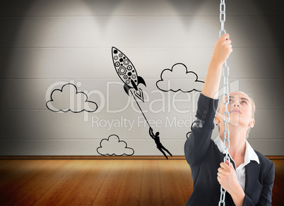 Composite image of businesswoman pulling a chain