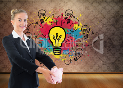 Composite image of businesswoman holding piggy bank