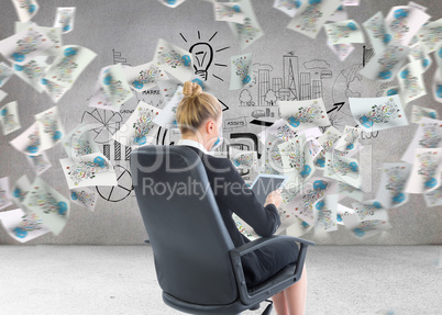 Composite image of businesswoman sitting on swivel chair with ta