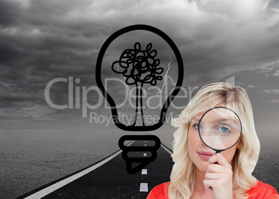 Composite image of fair-haired woman looking through a magnifyin