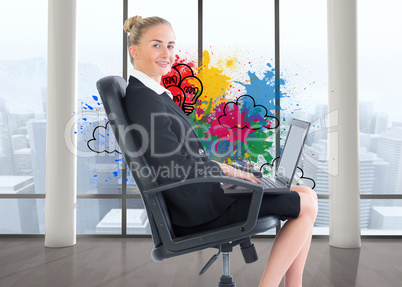 Composite image of businesswoman sitting on swivel chair with la