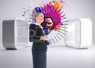 Composite image of businesswoman holding new tablet