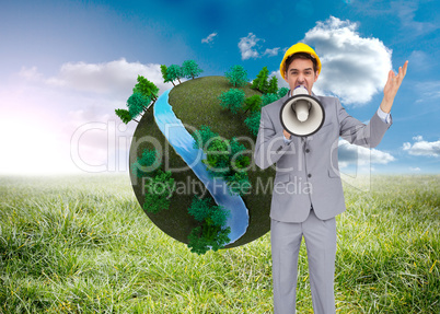 Composite image of architect with hard hat shouting with a megap
