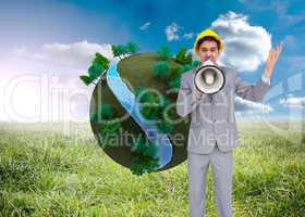 Composite image of architect with hard hat shouting with a megap