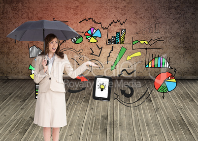 Composite image of elegant businesswoman holding black umbrella