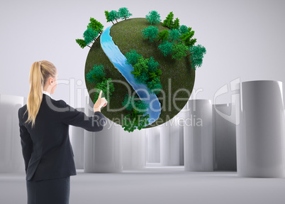 Composite image of businesswoman pointing somewhere