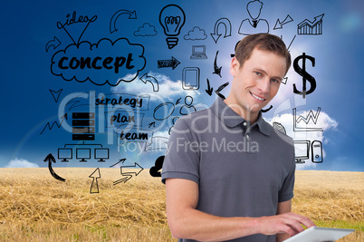 Composite image of smiling young man with tablet computer