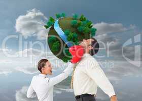 Composite image of businesswoman hitting a businessman with boxi