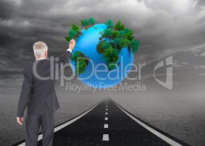 Composite image of rear view of serious businessman standing and