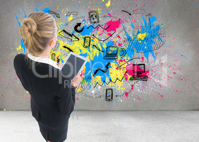 Composite image of businesswoman holding new tablet