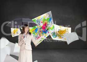 Composite image of elegant businesswoman holding black umbrella