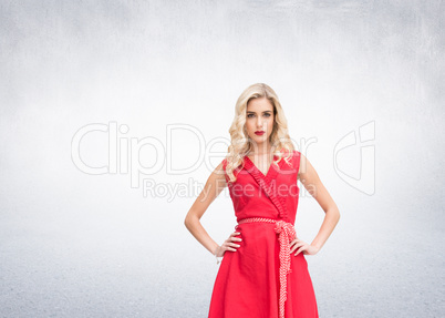 Composite image of elegant blonde standing hands on hips