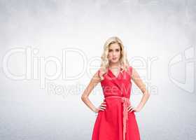 Composite image of elegant blonde standing hands on hips